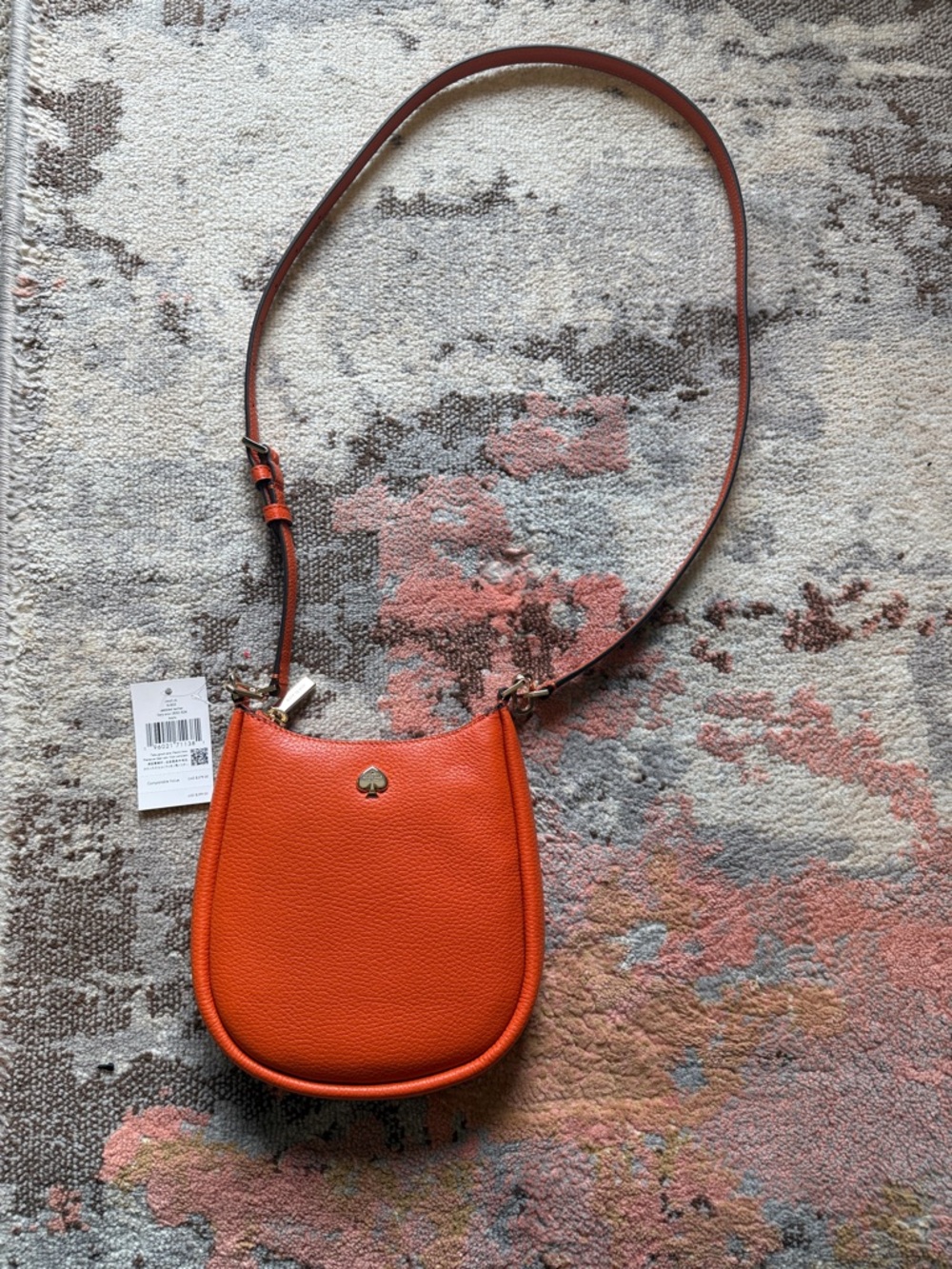 NWT kate spade orange pebbled leather crossbody with gold spade logo